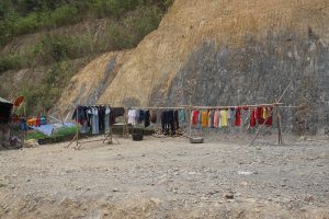 Typical: People Dry Clothes so that you can See them next to the Road | Laos