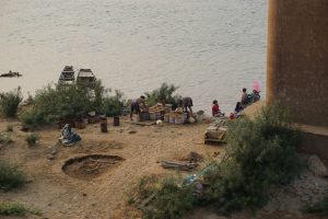 ...Looking Down to the River with Sand Gatherers...