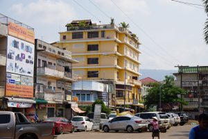 I Perfer this Pakse Hotel with Roof Garden...