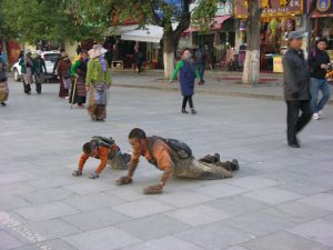 Pilgrims on Kora around Potala Palace | China