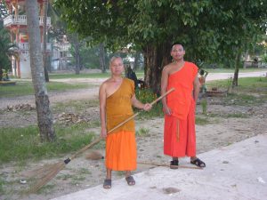 Monks everywhere and Doing their Work in Laos